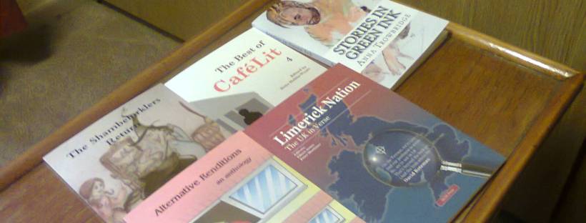 Some of the books my stories have appeared in - image taken by me.