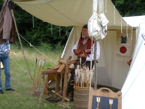 The King's Fletcher at work, showing off his wares and explaining what he did at a recent Medieval Weekend in Hampshire. Image taken by Allison Symes.