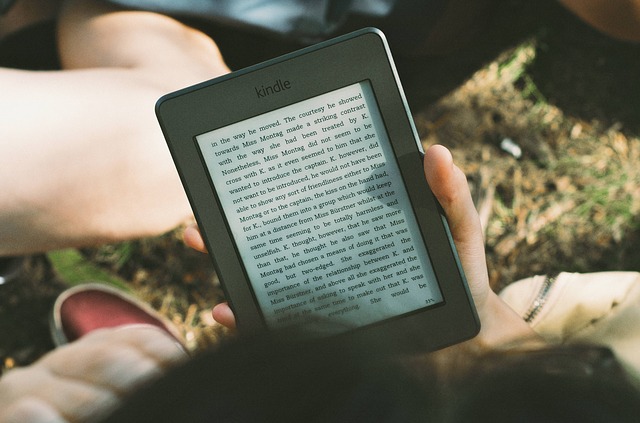 The modern way to read - the Kindle. Image via Pixabay.