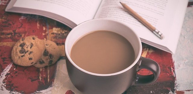 Relaxing with a good book. Image via Pixabay.