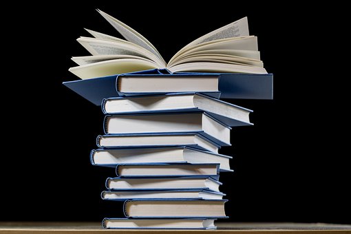 The To Be Read pile - image via Pixabay
