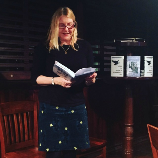Amanda Huggins reading from the Ink Tears showcase anthology Death of a Superhero at the launch party in London December 2017