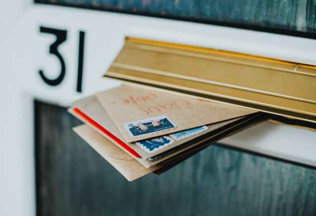 brown envelopes in mail box